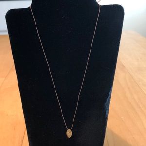 Necklace with a golden tourmaline stone